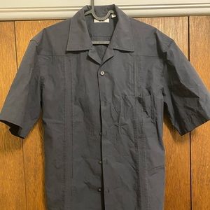 Uniqlo dark grey button up never been worn with out tags